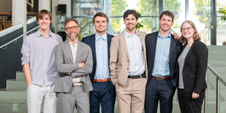Graduates of the year 2024 From left to right: Lasse Sternemann, Prof. Mirko Cinchetti, Richard Leven, David Gutnikov, Michael Gutnikov, and Mira Arndt at the graduation ceremony on May 10, 2025.